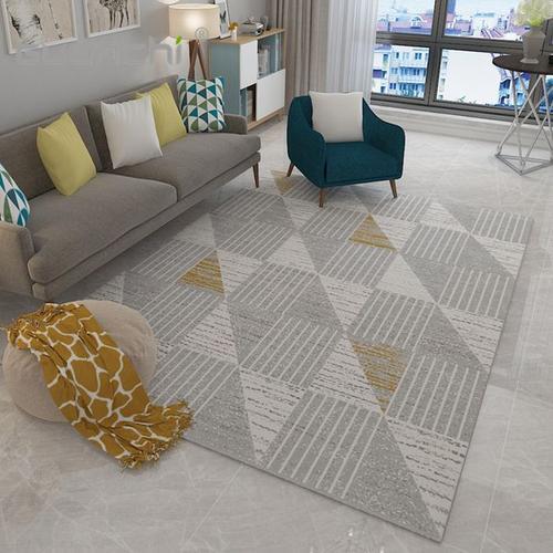 最佳的客厅地毯尺寸是：地毯的长度和宽度超过最长沙发的长度和宽度
